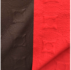 TECIDO PARA COLCHA MATELADO LISO LG 2,40 COR TABACO/ VERMELHO